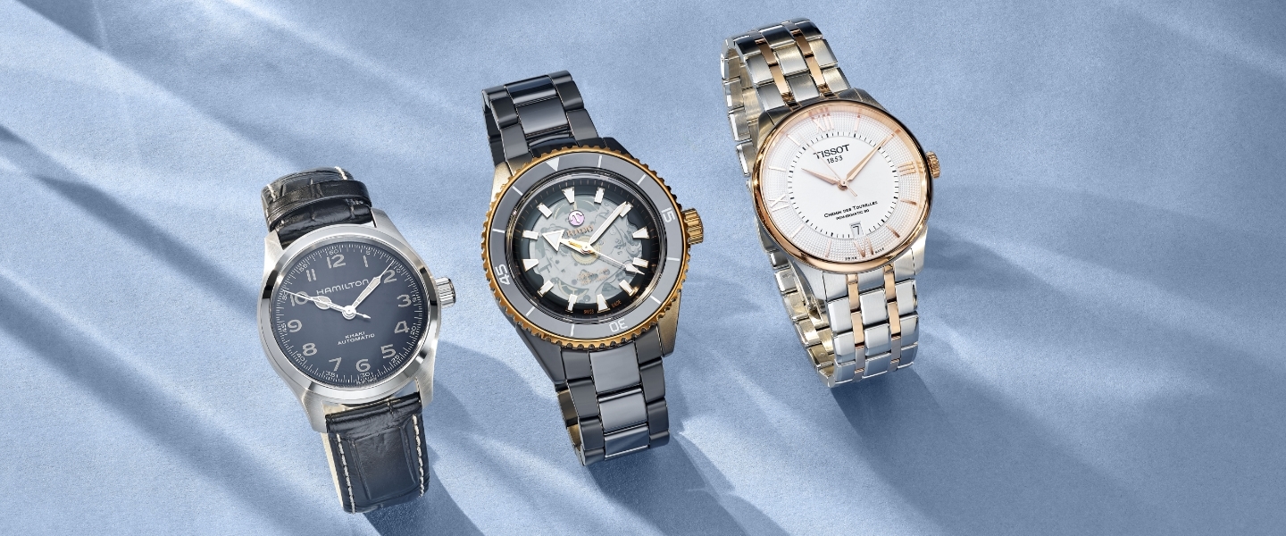 Image of watches from Ernest Jones on blue background